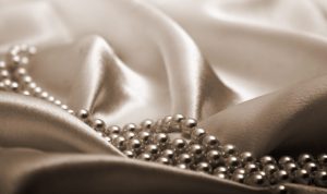 cropped-fabric-and-pearls.jpg